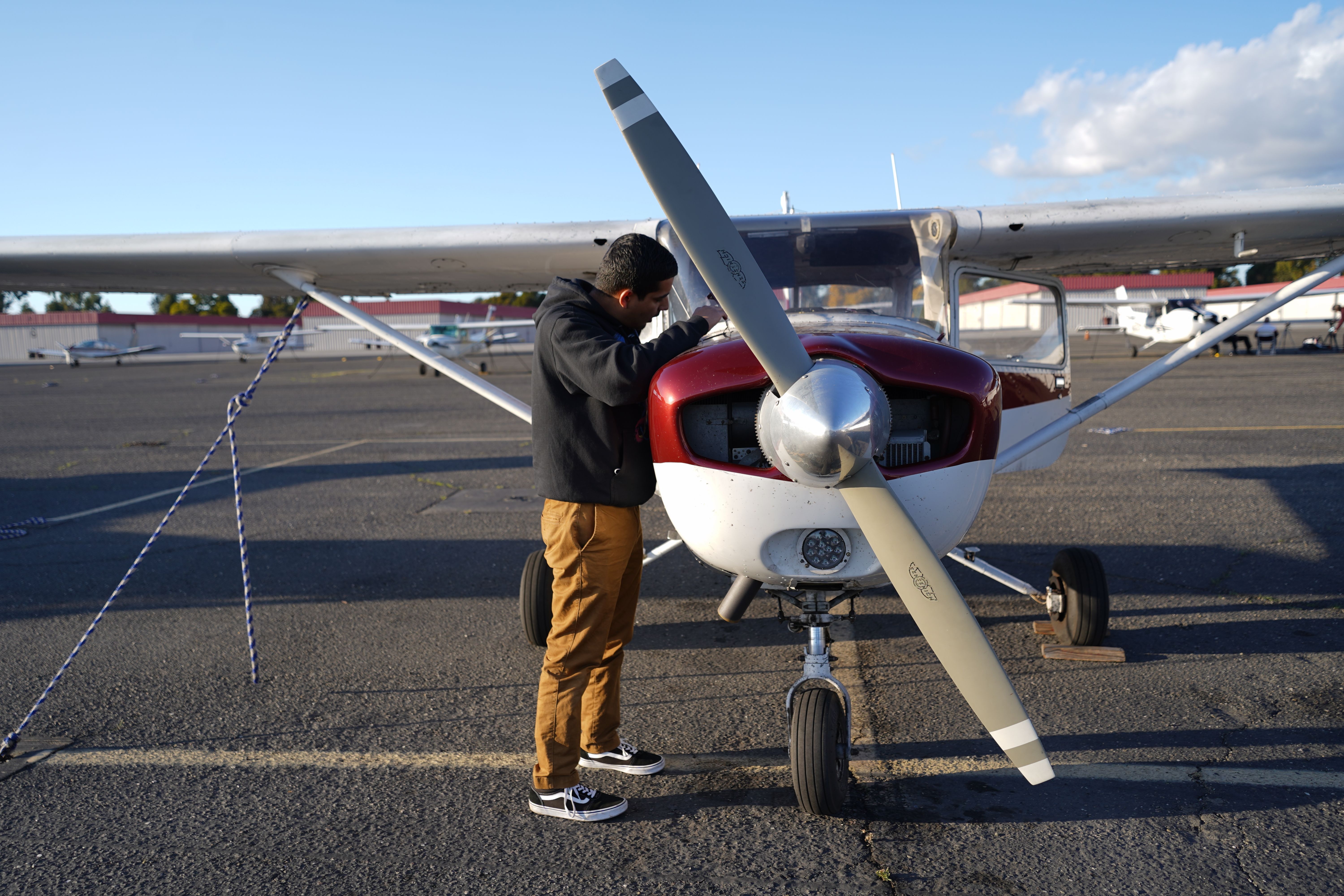 Cadet walking to training aircraft